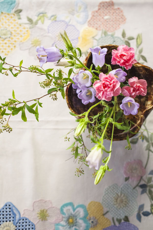 Chiho's Ikebana on her mother's intricate embroidered table cloth